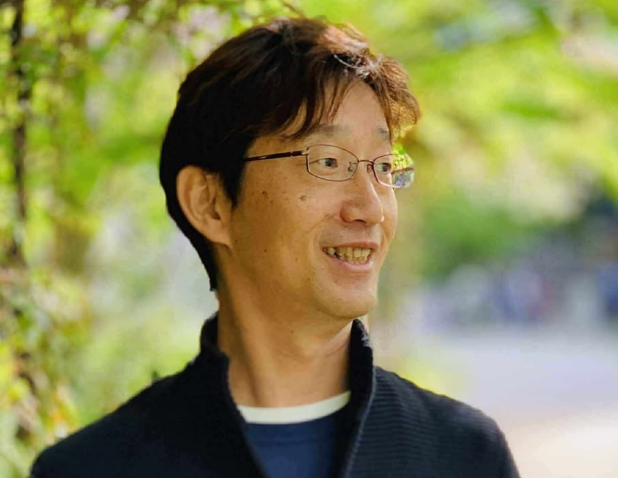 尾﨑 健二 氏